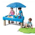 Step2 Cascading Cove Sand and Water Table Kids Activity Sensory Playset Comes with Umbrella Summer Outdoor Toys 7 Piece Toy Accessories For Toddlers 1.5+ Years Old